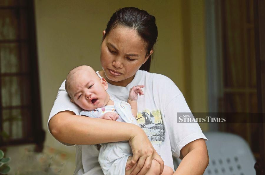 Four-month-old Siew Zheng You was diagnosed with Transposition of the Great Arteries (TGA) and Ventricular Septal Defect (VSD) when the toddler was three-month-old. - NSTP/ROHANIS SHUKRI.
