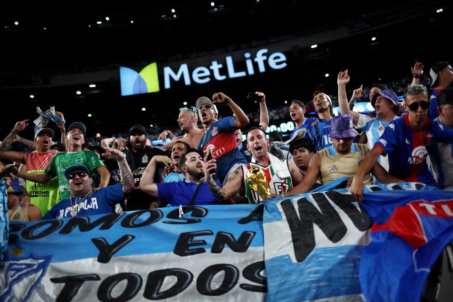 Argentina fans celebrate after the match. REUTERS PIC