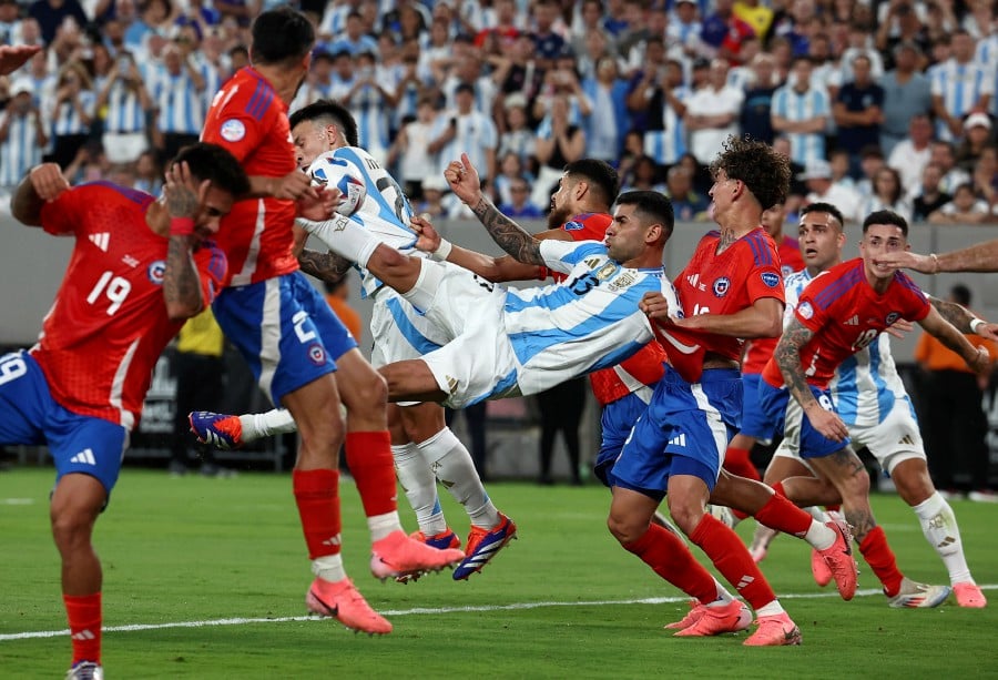 Argentina's Cristian Romero shoots at goal. REUTERS PIC