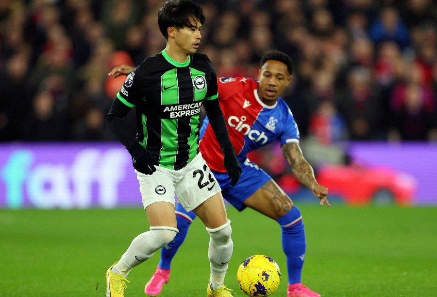 Brighton's Kaoru Mitoma in action with Crystal Palace's Nathaniel Clyne during the match at Selhurst Park, London, Britain. - REUTERS PIC