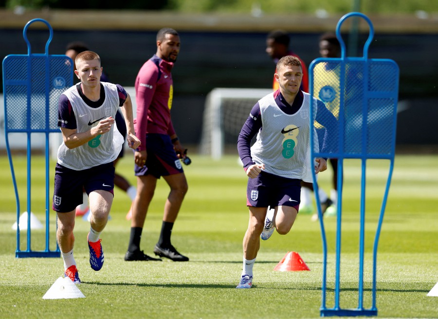 England's Kieran Trippier (Right) and Adam Wharton during training at Rockliffe Park, in Middlesbrough, Great Britain. — Reuters