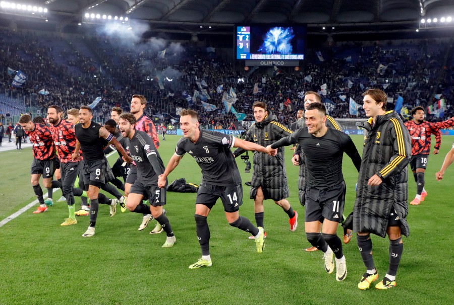 Juventus' Arkadiusz Milik and teammates celebrate after the match. REUTERS PIC