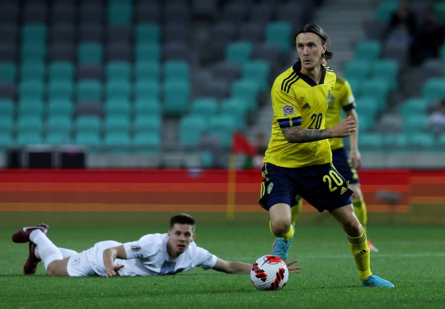 Sweden's Kristoffer Olsson in action against Slovenia. REUTERS FILE PIC