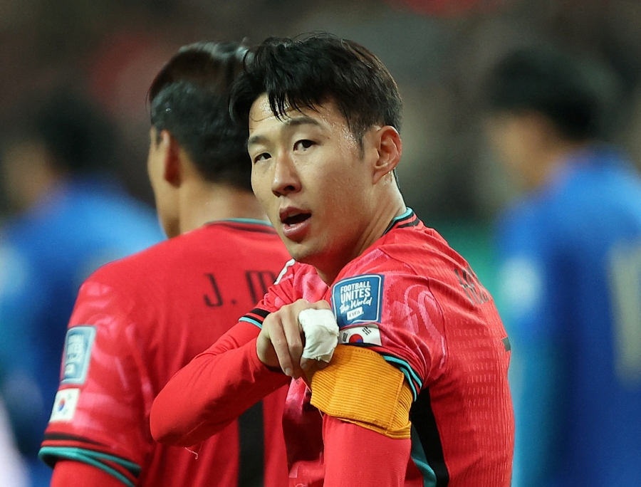 South Korea's Son Heung-min celebrates scoring their first goal. (REUTERS/Kim Hong-Ji)