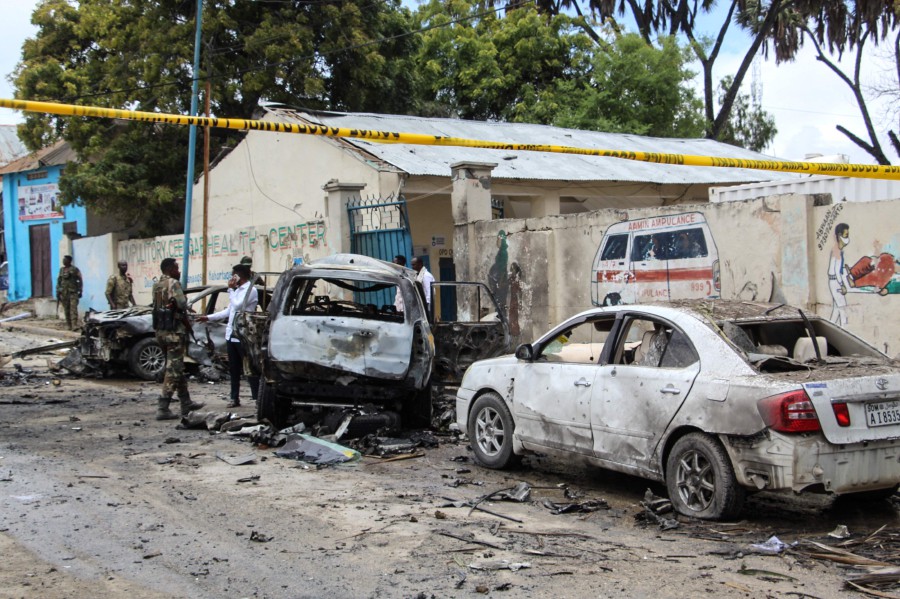 Security officers patrol on the site of a car-bomb attack in Mogadishu, on September 25, 2021. - AFP PIc