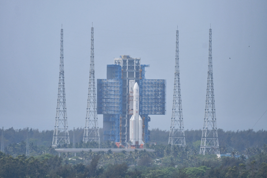 The Chang'e 6 lunar probe and the Long March-5 Y8 carrier rocket combination sit atop the launch pad at the Wenchang Space Launch Site in Hainan province, China. (cnsphoto via REUTERS)
