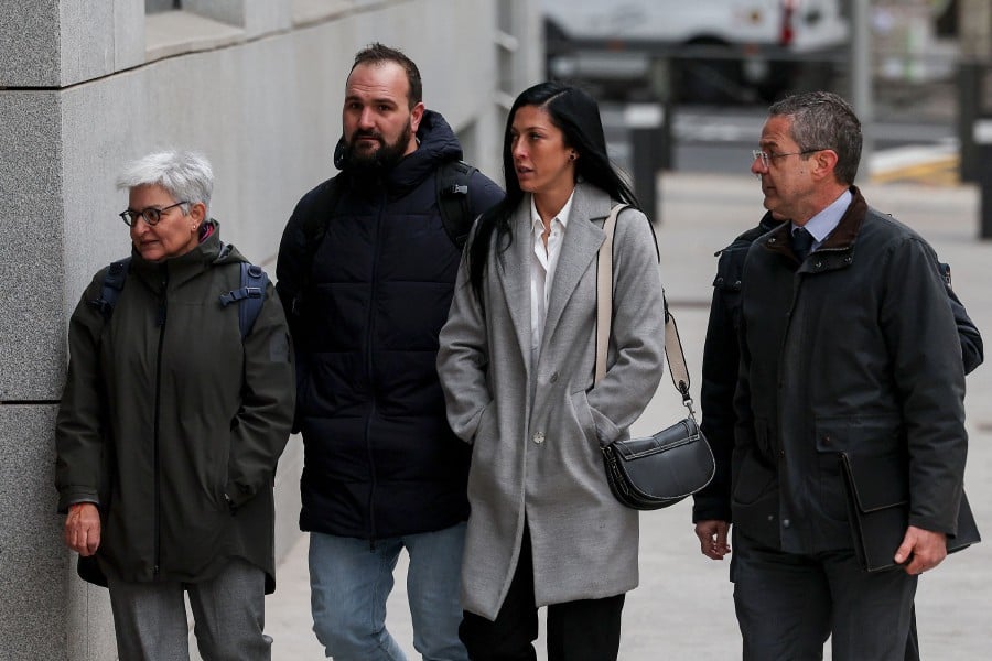 Spain's player Jennifer Hermoso (C) arrives before an audience at the Audiencia Nacional court in Madrid on January 2, 2024. Spain's player Jenni Hermoso was in court today testifying about the kiss forced on her by disgraced former Spanish football chief Luis Rubiales at the Women's World Cup. AFP PIC