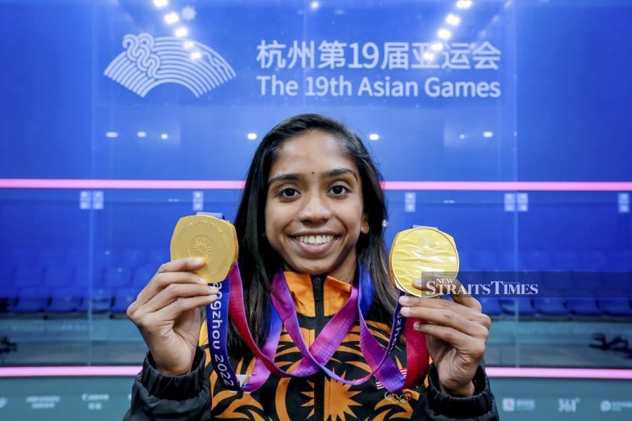A file pic dated Oct 5, shows S. Sivasangari with her gold medals during the 2023 Asian Games in Hangzhou. -NSTP/ASYRAF HAMZAH