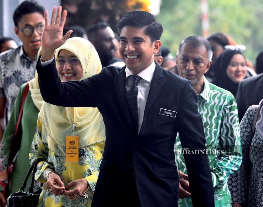 A file pic dated Nov 9, 2023, shows Syed Saddiq Syed Abdul Rahman arriving at the Kuala Lumpur Courts Complex ahead of his trial. -NSTP/FATHIL ASRI.