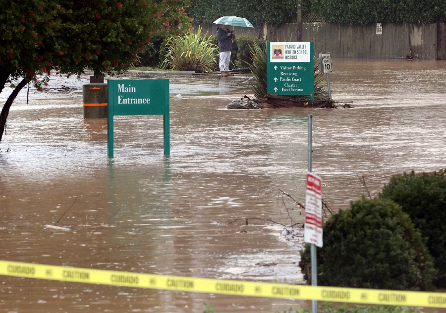 Storm struck California scrambles to clean up ahead of rain