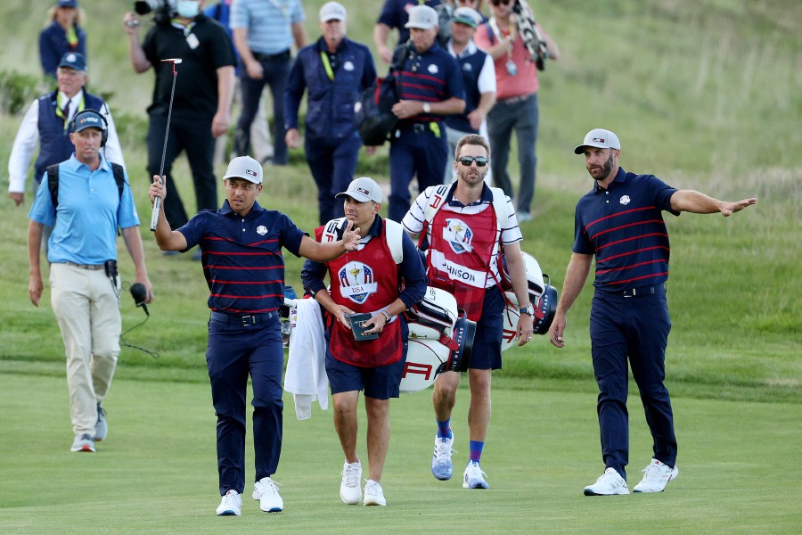 Xander Schauffele and Dustin Johnson of team United States walk on the 17th hole during Friday Afternoon Fourball Matches of the 43rd Ryder Cup at Whistling Straits in Kohler, Wisconsin. - AFP PIC
