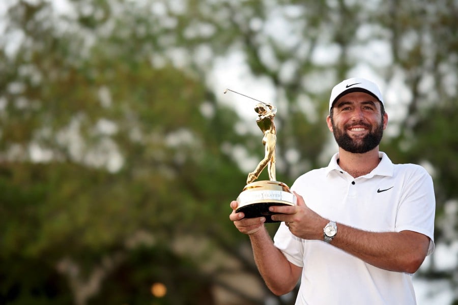 Scottie Scheffler of the United States poses with the trophy after winning The Players Championship at TPC Sawgrass in Ponte Vedra Beach, Florida. - AFP PIC