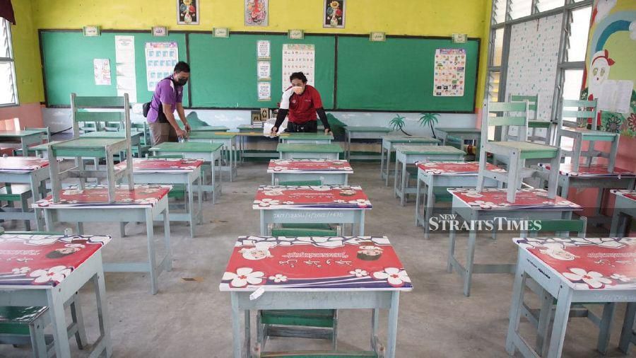 After being forced to halt physical operations due to spikes in Covid-19 cases, schools across the country will reopen in stages, starting tomorrow. - NSTP/NUR ADIBAH AHMAD IZAM