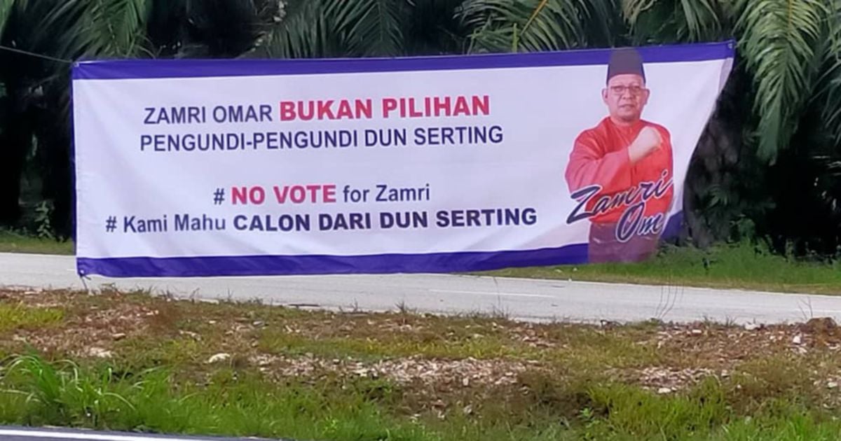 Banner Telling Voters To Reject Barisan Nasional Candidate In Serting 