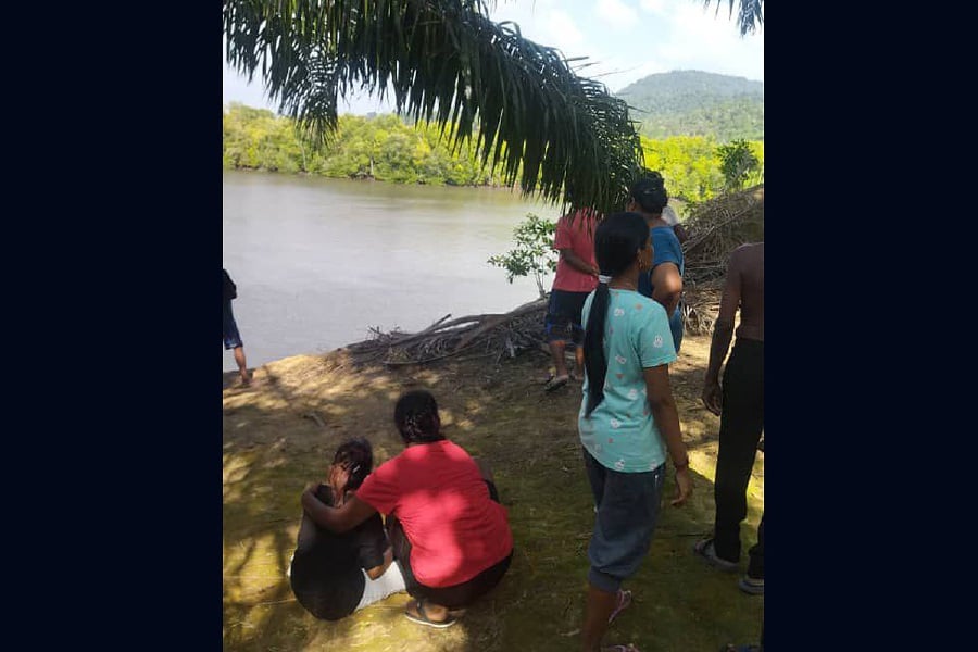 Three teenage friends are feared to have drowned in Sungai Sempit at Kampung Tanjung Batu Segari, near Pantai Remis, today. - Pic courtesy of Fire anf Rescue Dept