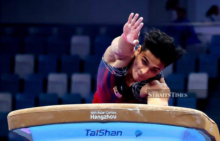 Artistic gymnast Sharul Aimy Kamaru Hisam's decision to skip the World Championships paid off when he won the vault bronze medal in the Asian Games today. - NSTP/ASYRAF HAMZAH