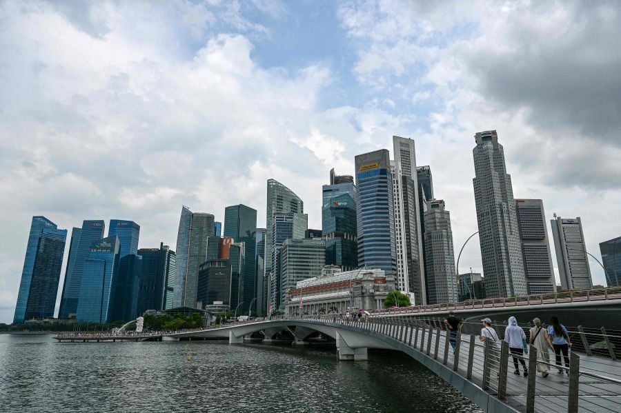 Singapore has stepped up security measures, including at the country’s checkpoints, following an attack at the Ulu Tiram police station in Johor, on Friday which killed two police officers and injured another. - AFP pic