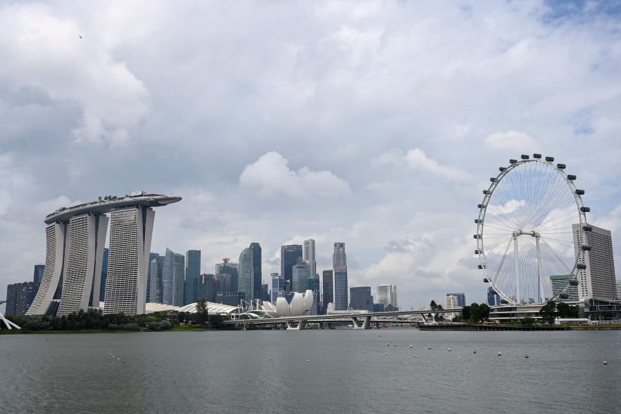Singapore is budgeting for a “small surplus” of S$0.8 billion for the financial year 2024, or 0.1 per cent of the country’s Gross Domestic Product (GDP), which is essentially a balanced fiscal position. — AFP 