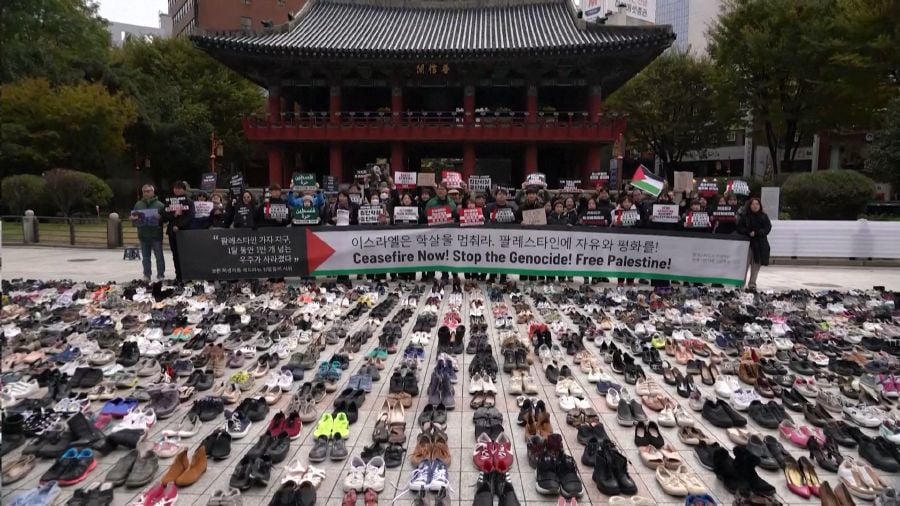 South Korean protesters display 2,000 shoes in solidarity with Palestinian victims, calling for a ceasefire in Gaza. - REUTERS