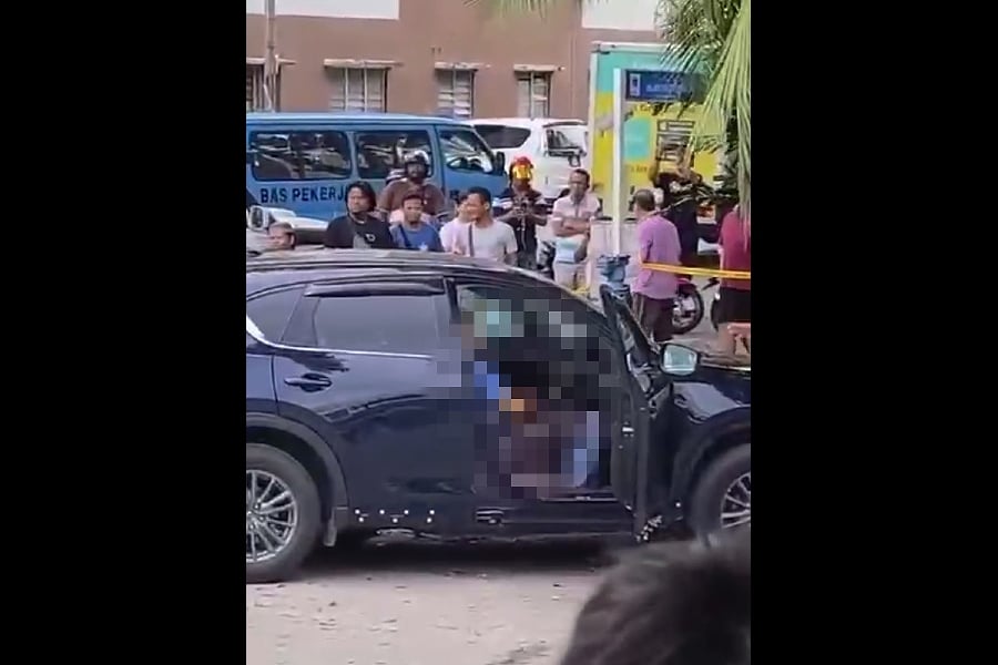A man is believed to have slashed his wife several times with a knife in a car in front of a condominium in Kota Bayu Emas near here yesterday afternoon, before harming himself with the knife later. - Pic courtesy from reader