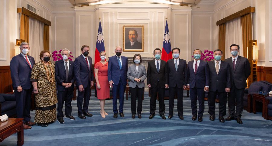 A handout picture taken and released by Taiwan’s Presidential Office on August 15, 2022 shows Taiwan President Tsai Ing-wen (C) posing for photographs with US delegation at the Presidential Office in Taipei. - AFP pic