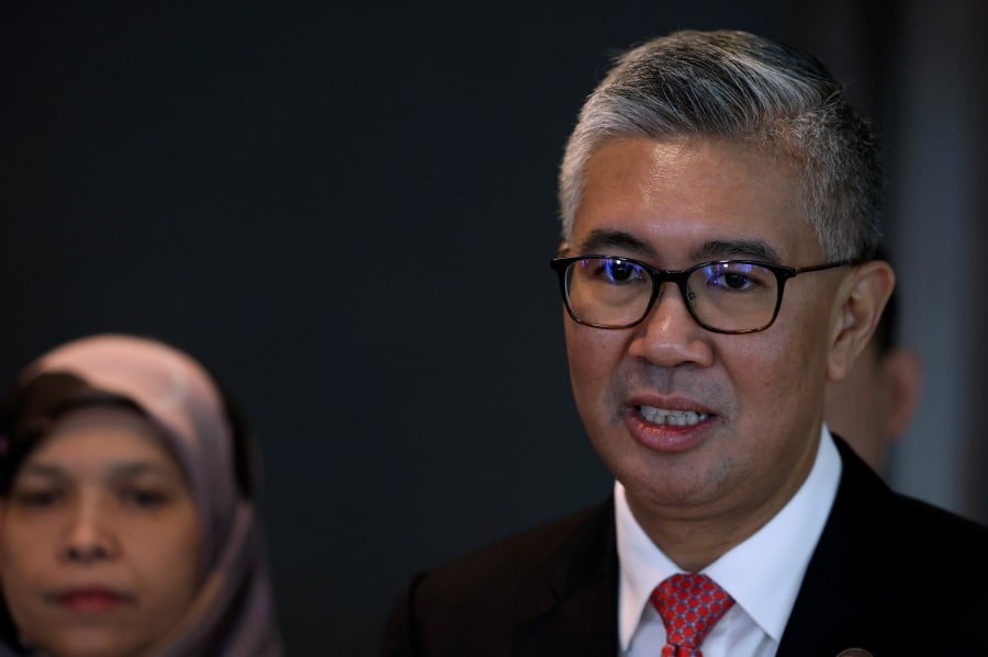 Investment, Trade and Industry Minister Tengku Datuk Seri Zafrul Tengku Abdul Aziz is expected to lodge a police report over a viral video which claims that he was involved in a scam, once he returns from Australia. BERNAMA PIC