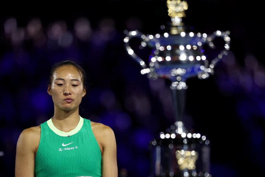 China's Qinwen Zheng looks dejected during the trophy ceremony after losing the final against Belarus' Aryna Sabalenka. REUTERS PIC