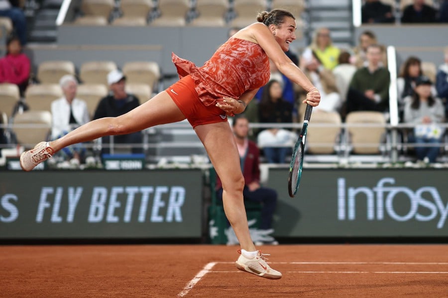 Belarus' Aryna Sabalenka serves to Russia's Mirra Andreeva during their women's singles match on Court Philippe-Chatrier on day three of the French Open tennis tournament at the Roland Garros Complex in Paris on May 28, 2024. AFP PIC