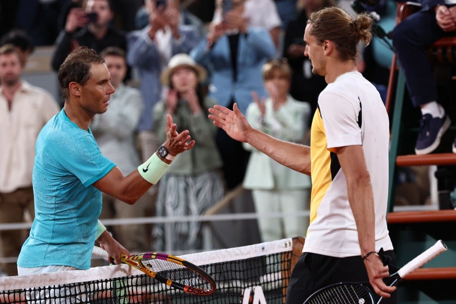 Spain's Rafael Nadal checks hands with the winner Germany's Alexander Zverev after their men's singles match on Court Philippe-Chatrier on day two of the French Open tennis tournament at the Roland Garros Complex in Paris on May 27, 2024. AFP PIC
