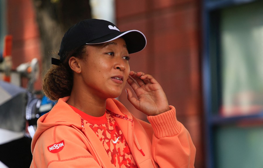 Japan's Naomi Osaka speaks during a interview ahead of the 2021 US Open Tennis tournament at the Billie Jean King Natinal Tennis Center in Queens, New York. (Photo by Kena Betancur / AFP)