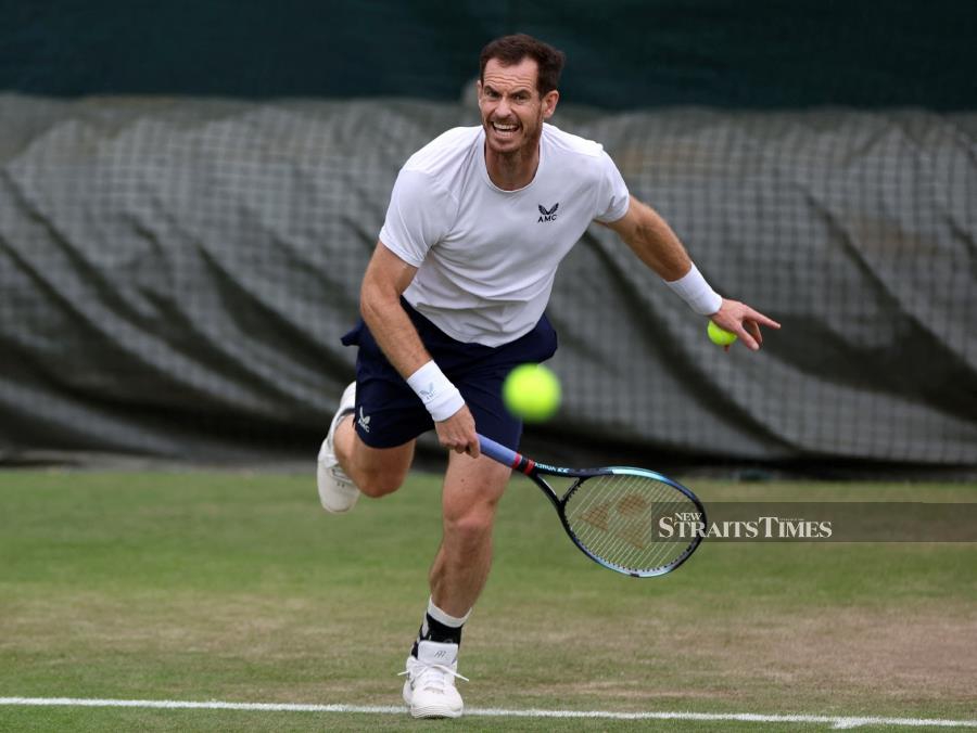 Britain's Andy Murray during a practice session at All England Lawn Tennis and Croquet Club, London, Britain on Monay. REUTERS PIC