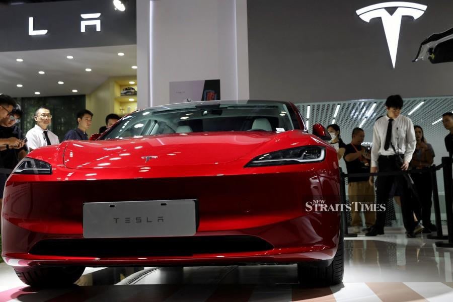 Tesla's new Model 3 sedan is seen displayed. REUTERS/Florence Lo
