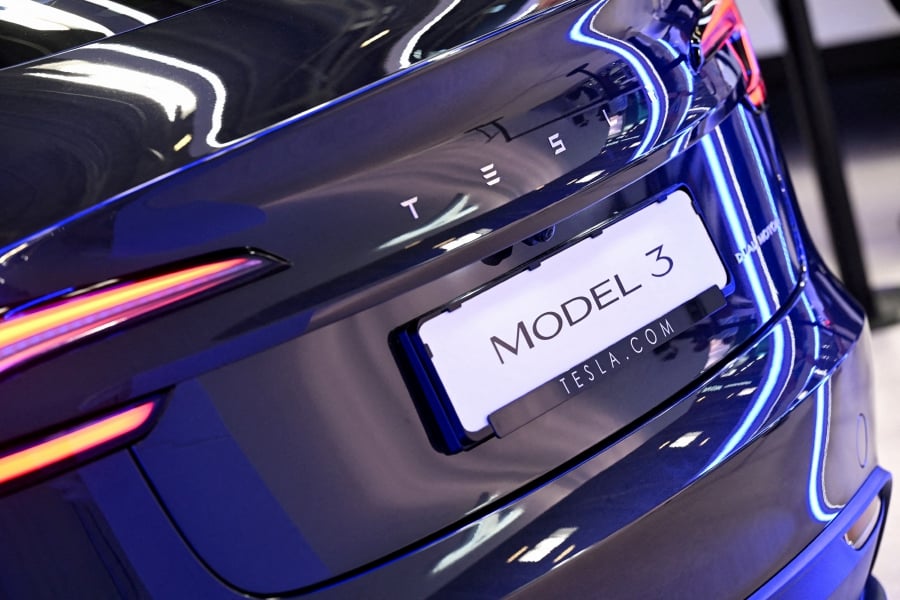 (FILE PHOTO) Tesla's Model 3 is displayed during an event a day ahead of the official opening of the 2023 Munich Auto Show IAA Mobility, in Munich, Germany. (REUTERS/Angelika Warmuth/File Photo)