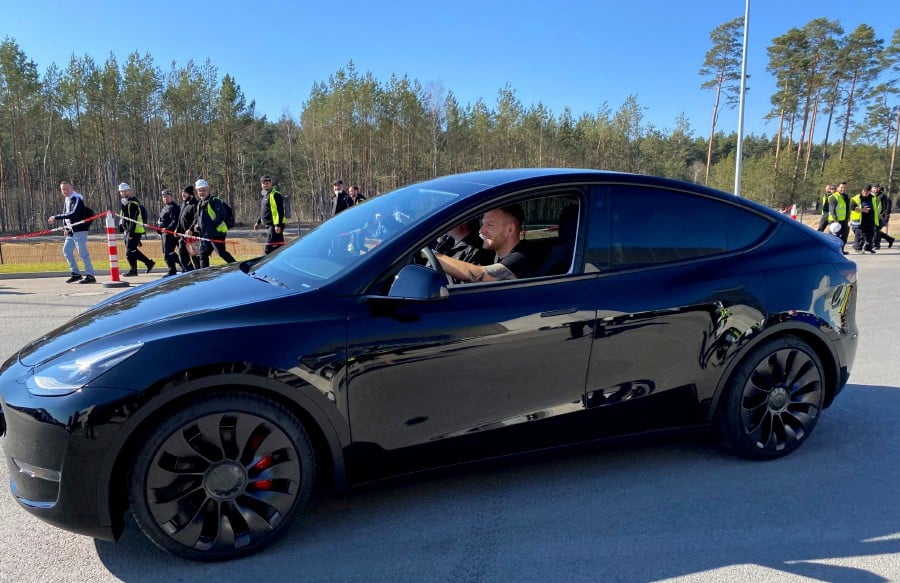Tesla shows off restyled Model 3 sedan at Beijing trade fair