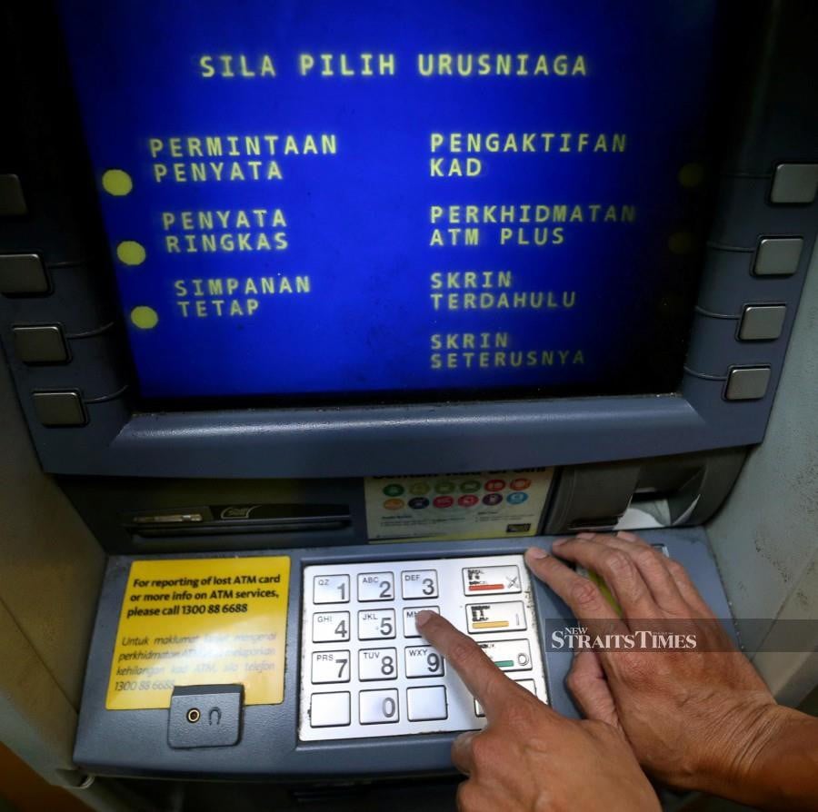 Cops nab man who kicked bank's ATM screens | New Straits Times ...