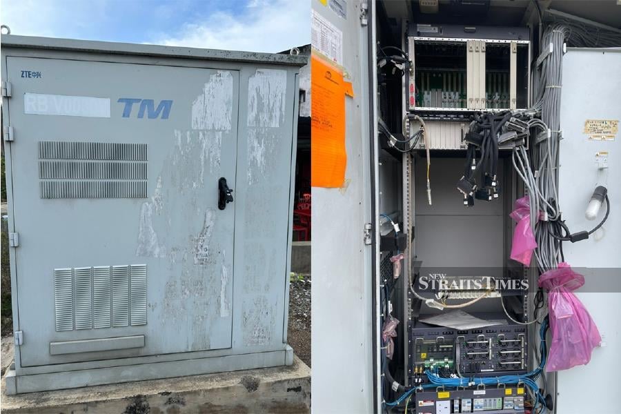 The Telekom Malaysia (TM) roadside cabinets with the missing electronic components in Lipis. - NSTP/AMIR HAMZAH NORDIN