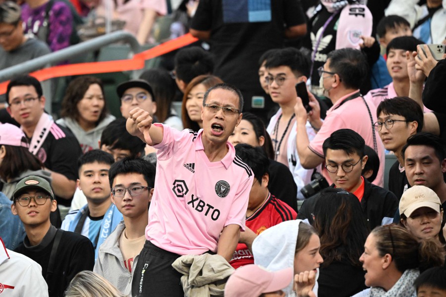TOPSHOT - Fans react after not seeing Inter Miami's Argentine forward Lionel Messi play after the friendly football match between Hong Kong XI and US Inter Miami CF in Hong Kong on February 4, 2024. Inter Miami were booed off the pitch after their injured superstar Lionel Messi failed to take the field in a pre-season friendly in Hong Kong. AFP PIC