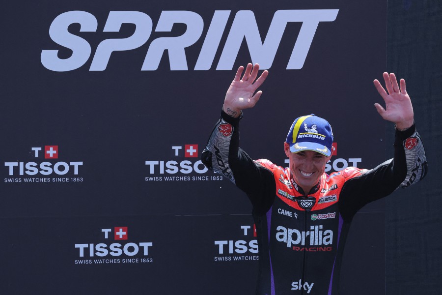 Aprilia Spanish rider Aleix Espargaro celebrates after winning the MotoGP Sprint Race of the Moto Grand Prix of Catalonia at the Circuit de Catalunya on May 25, 2024 in Montmelo on the outskirts of Barcelona. - AFP pic