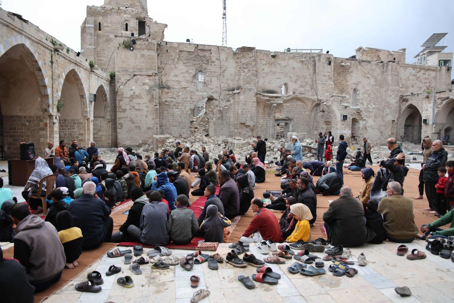 Palestinian worshippers gather on April 10, 2024 in the courtyard of Gaza City's historic Omari Mosque, which has been heavily damaged in Israeli bombardment during the ongoing battles between Israel and Hamas, on the first day of Eid al-Fitr to mark the end of the Islamic fasting month of Ramadan. AFP PIC