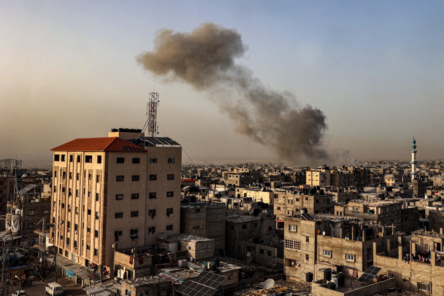 Smoke billows over buildings following Israeli bombardment in Rafah in the southern Gaza Strip on March 27, 2024, amid the ongoing conflict between Israel and the Palestinian group Hamas. AFP PIC