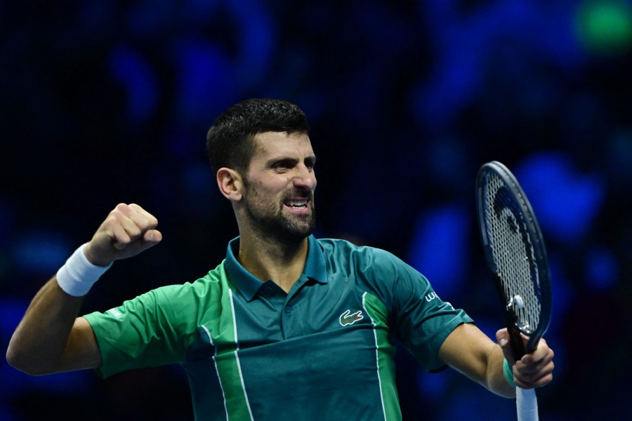Serbia's Novak Djokovic celebrates after winning against Spain's Carlos Alcaraz during their semi-final match at the ATP Finals tennis tournament in Turin on November 18, 2023. AFP FILE PIC
