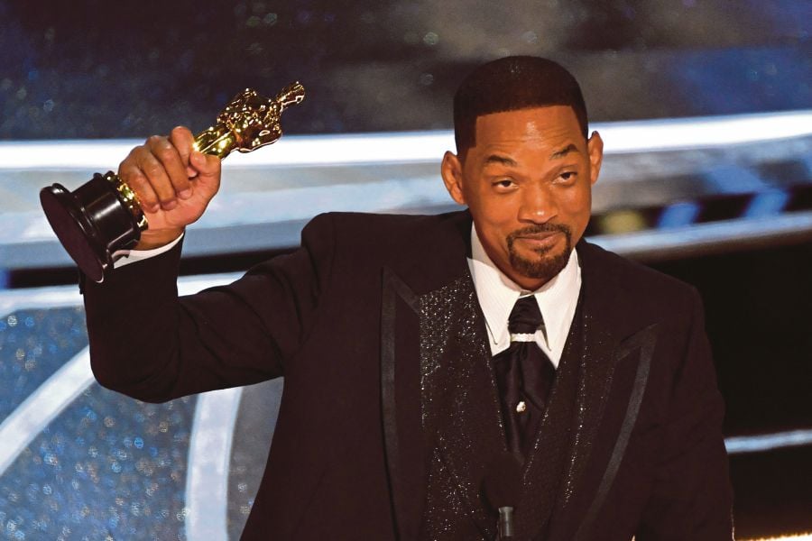 Will Smith bags first Oscar moments after slapping Chris Rock on stage