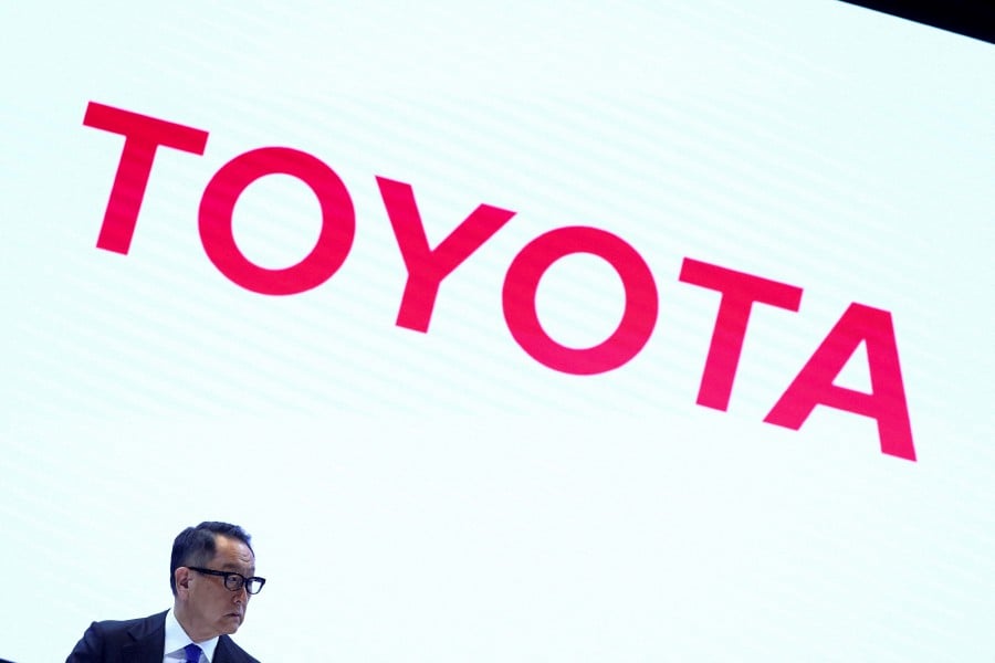 Akio Toyoda’s re-appointment was widely expected given shareholdings in the automaker owned by other Toyota group firms, record business results and his popularity among Japanese retail investors. -- Reuters photo