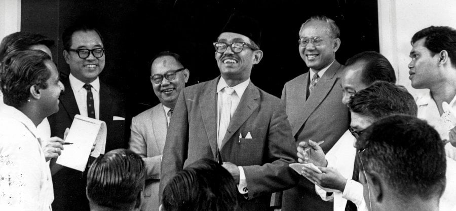 The late Tun Dr Ismail Abdul Rahman (centre) in a photo taken on 30 October 1963 after a cabinet meeting in Kuala Lumpur. - Pic courtesy of ARKIB NSTP