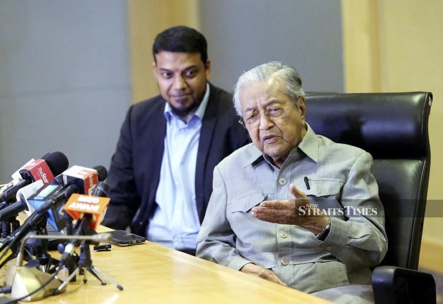 Former prime minister Tun Dr Mahathir Mohamad speaking to the media after having his statement recorded at the Perdana Leadership Foundation in Putrajaya. NSTP/SAIFULLIZAN TAMADI