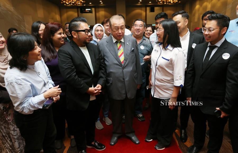 Tengku Sulaiman Shah Al-Haj ibni Almarhum Sultan Salahuddin Abdul Aziz Shah Al-Haj (centre) takes a group photo with members of the Malaysian Inbound Tourism Association (MITA) in Sepang. -NSTP/ROHANIS SHUKRI