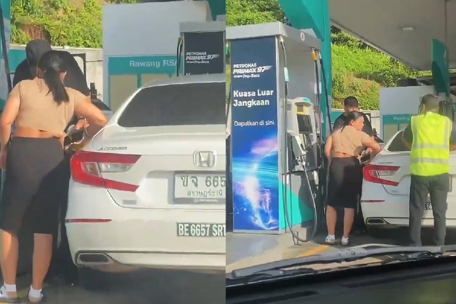 Netizens were frustrated when they saw a viral video showing a woman filling up her Thai registered car with subsidised fuel in Rawang, Selangor. - Video Screengrab from X 