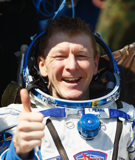 Member of the International Space Station (ISS) crew Tim Peake of Britain gestures shortly after landing near the town of Zhezkazgan, Kazakhstan, on June 18, 2016. AFP PHOTO 