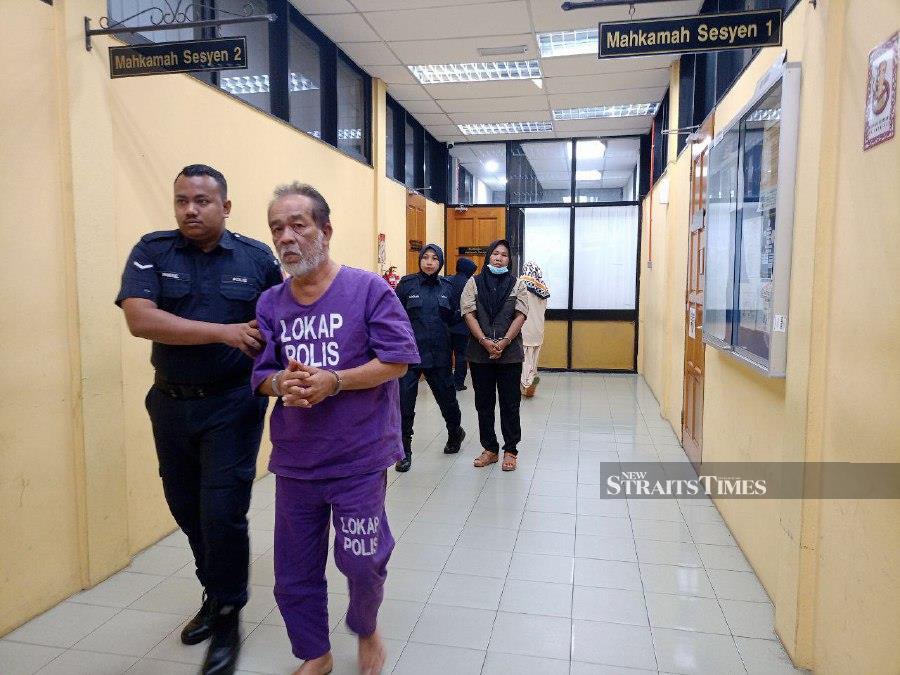 Kamarulzaman Abd Wahab and his 54-year-old wife Supiani only nooded their heads when the charges of their offence were read to them before Judge Intan Nurul Farena Zainal Abidin. - NSTP/MUHAMAD LOKMAN KHAIRI