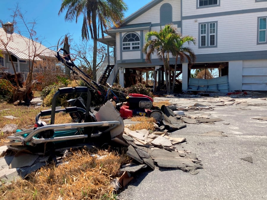 After Ian, coastal residents return to pick up the pieces | New Straits ...